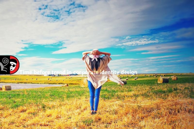 Time before trend illustrated through human presence within vast grassland, emphasizing scale, duration, and judgment in corporate identity design